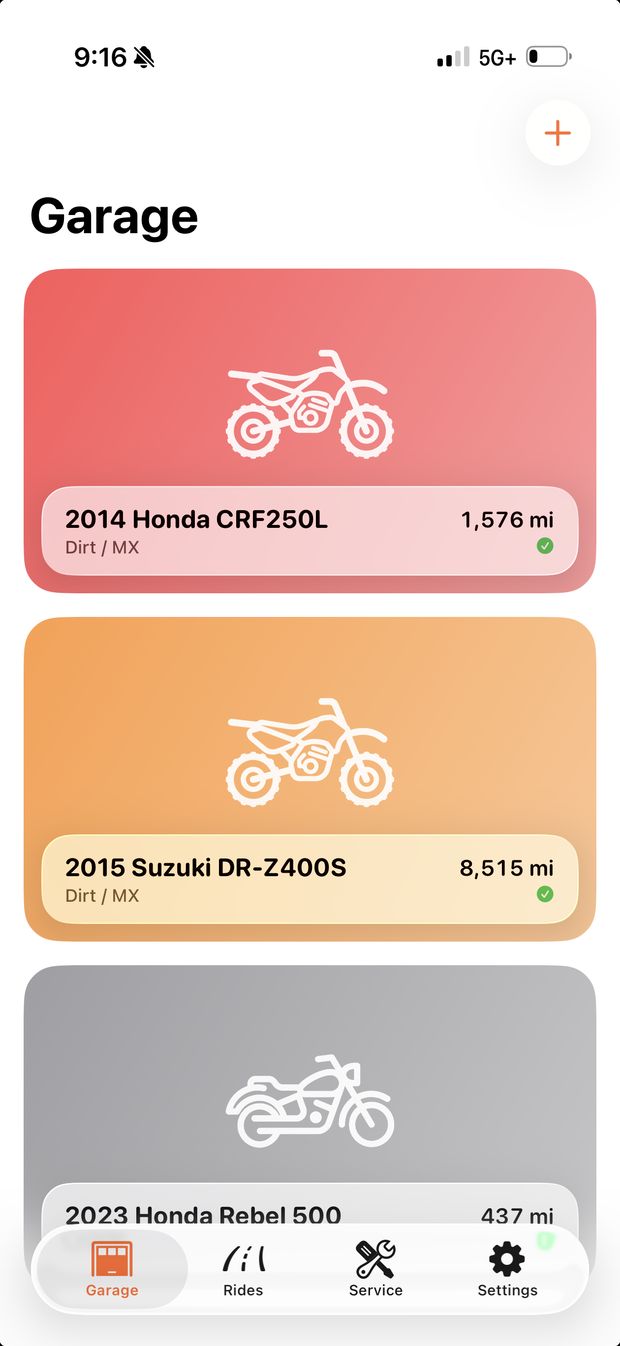 The Garage tab with three bike cards: a 2014 Honda CRF250L at 1,576 mi, a 2015 Suzuki DR-Z400S at 8,515 mi, and a 2023 Honda Rebel 500 at 437 mi.